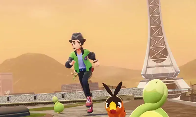 Spieler und sein Team von Pokémon blicken auf Illumina City bei Sonnenuntergang